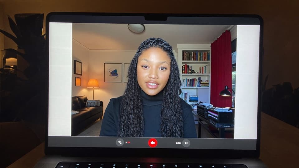 Guest joining a live interview from a home office